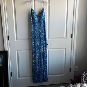 A blue sequence prom dress